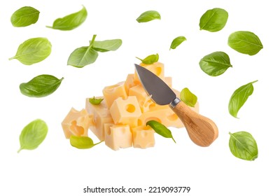 Cheese With Holes And Basil Leaves Isolated On White Background. Gouda Cheese Cubes,cheese Knife