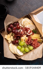 Cheese And Meat Assortment In A To Go Box, Food Delivery Or Catering Concept