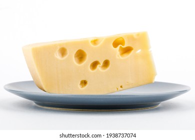 Cheese On A Plate, Isolated On A White Background