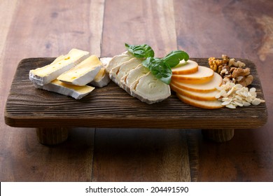 Cheese On Wooden Platter