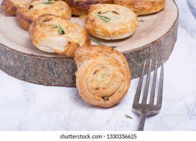 Cheese Pinwheels On Raw Wooden Board