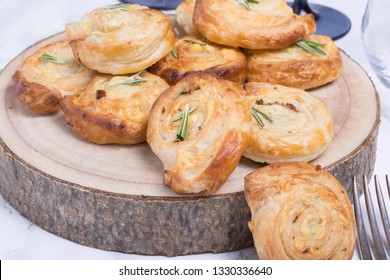 Cheese Pinwheels On Raw Wooden Board