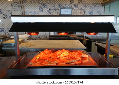 Cheese Pizza Base In Heat Lamp Food Station