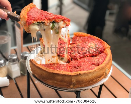 Cheese pizza, Chicago style deep dish italian cheese pizza with tomato sauce. Stock photo © 