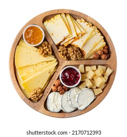 Cheese Plate Isolated On White Background. Different Cheese Served With Nuts And Jam On Wooden Tray. Cheese Platter. Top View.