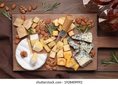 Cheese Plate With Rosemary And Nuts On Wooden Table, Flat Lay