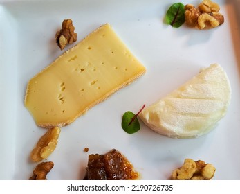 Cheese Plate With Walnuts And Fig Preserves