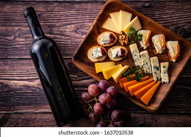 Cheese Platter And Wine Bottle