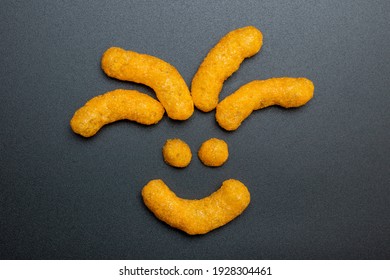 Cheese puffs, big, smile, flat lay, Cheese Doodle Day, face made of crisps, grin