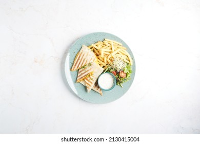 Cheese Quesadilla (Quesadilla De Queso) With French Fries Taken From Above On A White Background