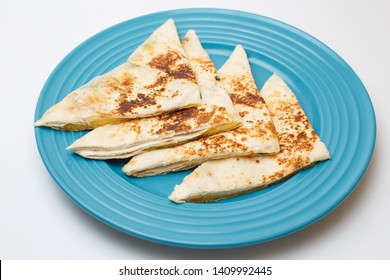 Cheese Quesadilla With Greens On A White Background