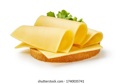 Cheese slices with salad leaf on piece of bread. Sandwich isolated on white background. - Shutterstock ID 1740035741