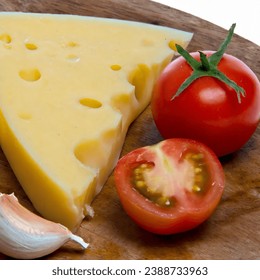 Cheese tomatoes garlic red wine grape meat olives spices sprig of rosemary wooden board bread milk in a basket cherries crackers honey nuts - Powered by Shutterstock