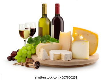 Cheeseboard, Grapes, Wineglasses And Wine Bottles