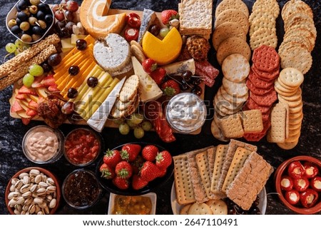 Cheeseboard Selection with Fruit and Snacks close up 3