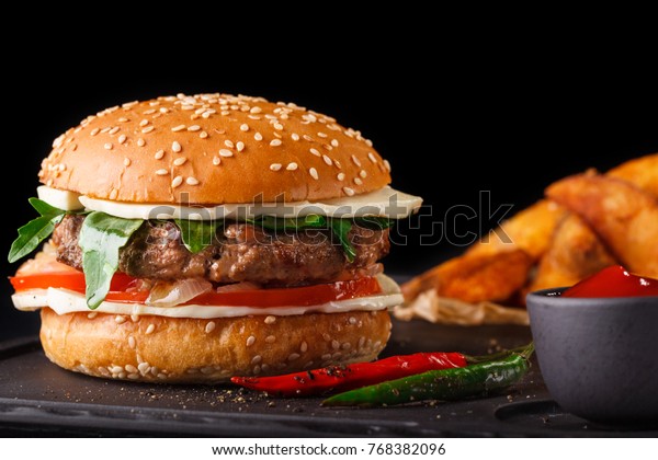 Cheeseburger On Black Background Stock Photo 768382096 | Shutterstock