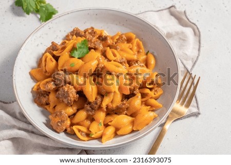 Cheeseburger Pasta with meat, tomato sauce, vegetables and cheese