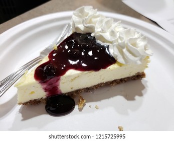 Cheesecake With Blueberry Compote And Cream