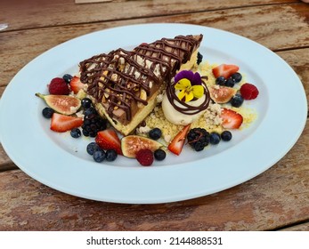 Cheesecake With Fruits And Peanut Marsipan.