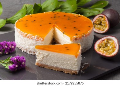 cheesecake with mango and passion fruit on a gray background - Powered by Shutterstock