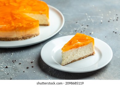 cheesecake with peache jelly, jam. delicious sweet dessert piece of cheesecake. Homemade cream cake with peaches.