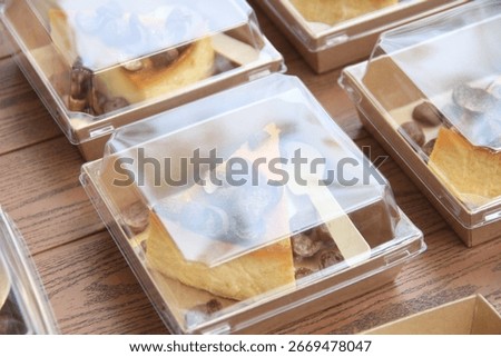 Cheesecake slice packed in plastic box