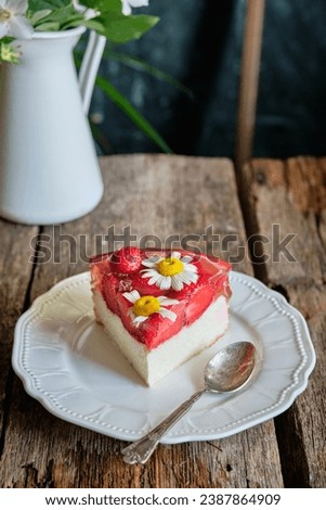 Cheesecake with strawberry-chamomile jelly layer.