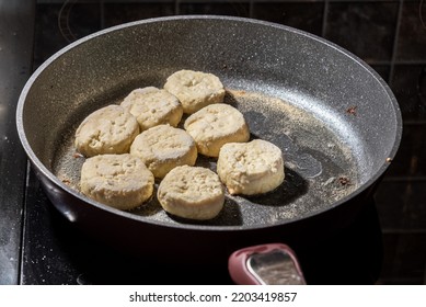 Cheesecakes Or Syrniki On A Pan. Russian And Ukrainian Cuisine