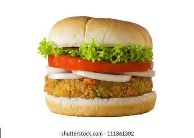 A cheese-free vegetarian burger made from vegetables and breadcrumbs, stacked with onion rings, slice of tomato and curly lettuce, in a bap.  Isolated on white. - Powered by Shutterstock