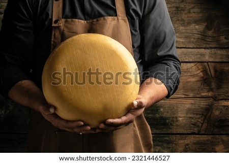 Similar – Image, Stock Photo Making a hole in a natural fiber hat