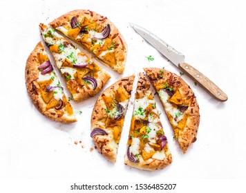 Cheesy Autumn Veggie Flatbread. Pumpkin, Sweet Potato, Red Onion, Mozzarella Pizza On Light Background, Top View                         