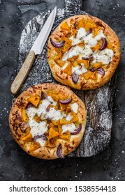 Cheesy Autumn Veggie Flatbread. Pumpkin, Sweet Potato, Red Onion, Mozzarella Pizza On Dark Background, Top View