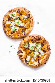 Cheesy Autumn Veggie Flatbread. Pumpkin, Sweet Potato, Red Onion, Mozzarella Pizza On Light Background, Top View         