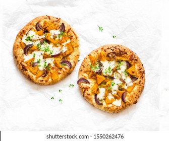 Cheesy Autumn Veggie Flatbread. Pumpkin, Sweet Potato, Red Onion, Mozzarella Pizza On Light Background, Top View                       