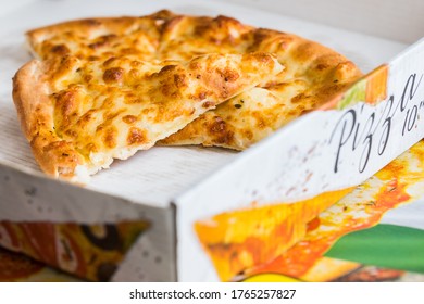 Cheesy Garlic Bread In A Pizza Box Pictured During A Takeaway.