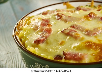 Cheesy Ham And Hash Brown Casserole,  Large Bowl, Mix Together Hash Browns, Ham, Cream Of Potato Soup, Sour Cream, And Cheddar Cheese