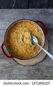 Cheesy Potato Hash Browns In Cast Iron Dish Flat Lay