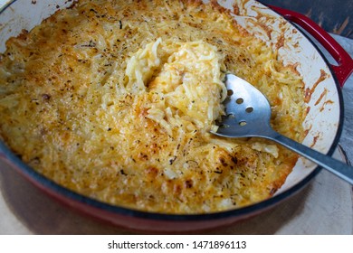 Cheesy Potato Hash Browns In Cast Iron Dish Flat Lay