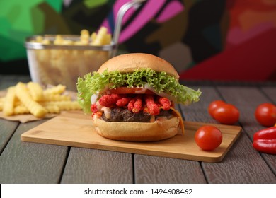 Cheetos Beef Burger On Wood Table