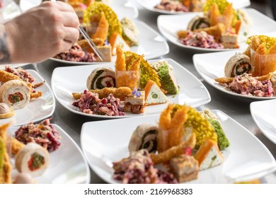 Chef Adding The Final Touch To The Starter Dish