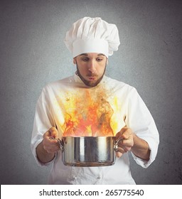 Chef Blowing His Burnt Food In Pot