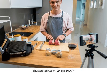 The chef is broadcasting live from workshop how to prepare a beef steaks on the electric grill