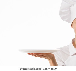 Chef Cook Holding An Empty Plate On White Background