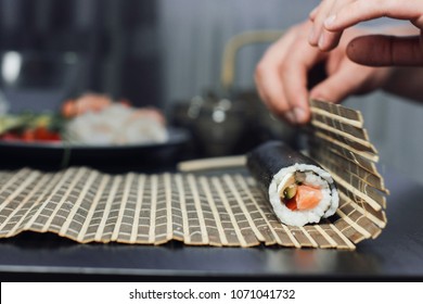 Chef Cook Making Sushi