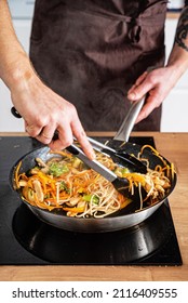 Chef Cooking Delicious Udon Wok. 