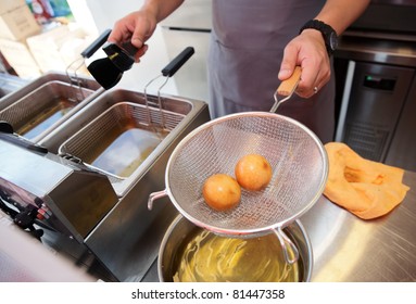 Chef Cooking Dim Sum In A Deep Fryer - Asian Takeout Food