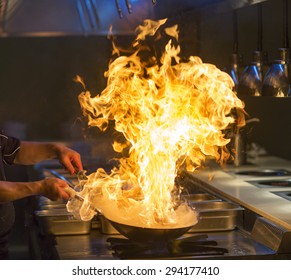 Chef Cooking With Flame