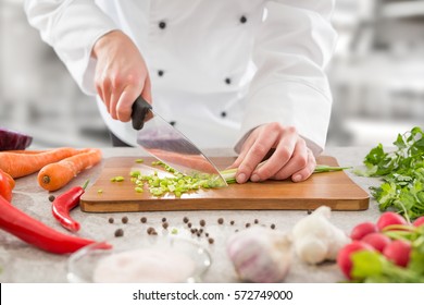 Chef Cooking Food Kitchen Restaurant Cutting Cook Hands Hotel Man Male Knife Preparation Fresh Preparing Concept - Stock Image