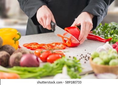 Chef Cooking Food Kitchen Restaurant Cutting Prepare Cook Hands Healthy Hotel Man Male Knife Preparation Fresh Preparing Young Natural Culinary Domestic Desktop Dietary Red Concept - Stock Image 