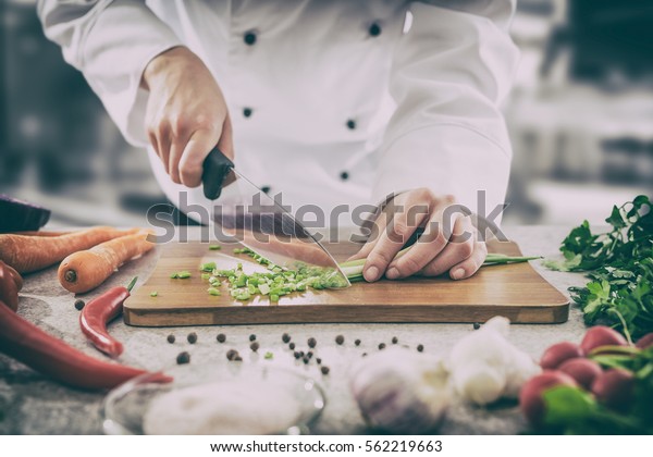chef cooking food kitchen restaurant cutting cook hands hotel man male knife preparation fresh preparing concept.
